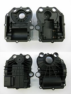 housing for electronic parking brake with molded plug contacts